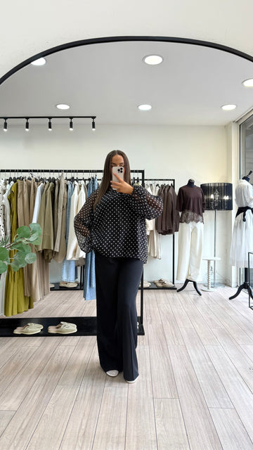 chemise à pois noir