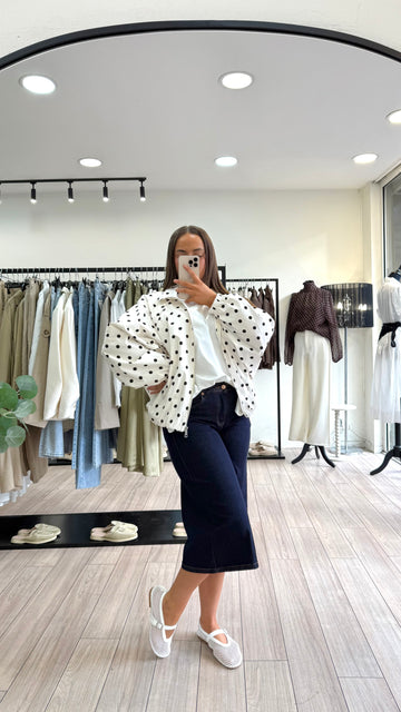 Veste à pois blanc